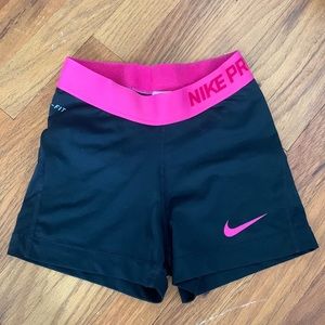Pink/black Nike pros